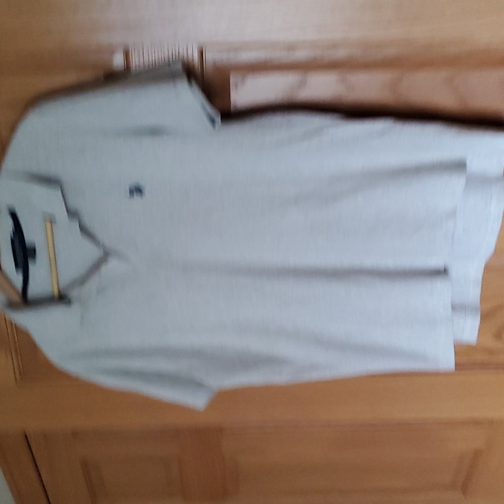 Men's tan polo shirt. Short sleeve cotton and viscose by U.S. Polo Assn.